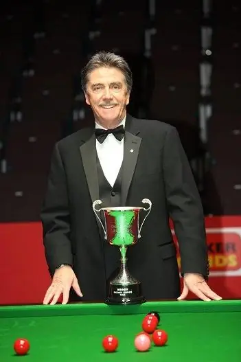 Cliff with a trophy at the table