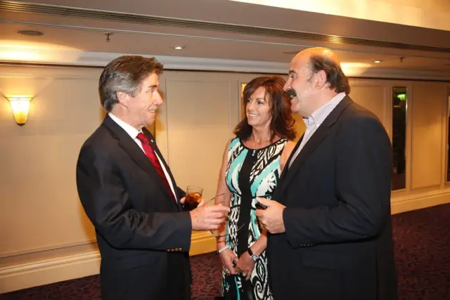 Chatting at an evening event