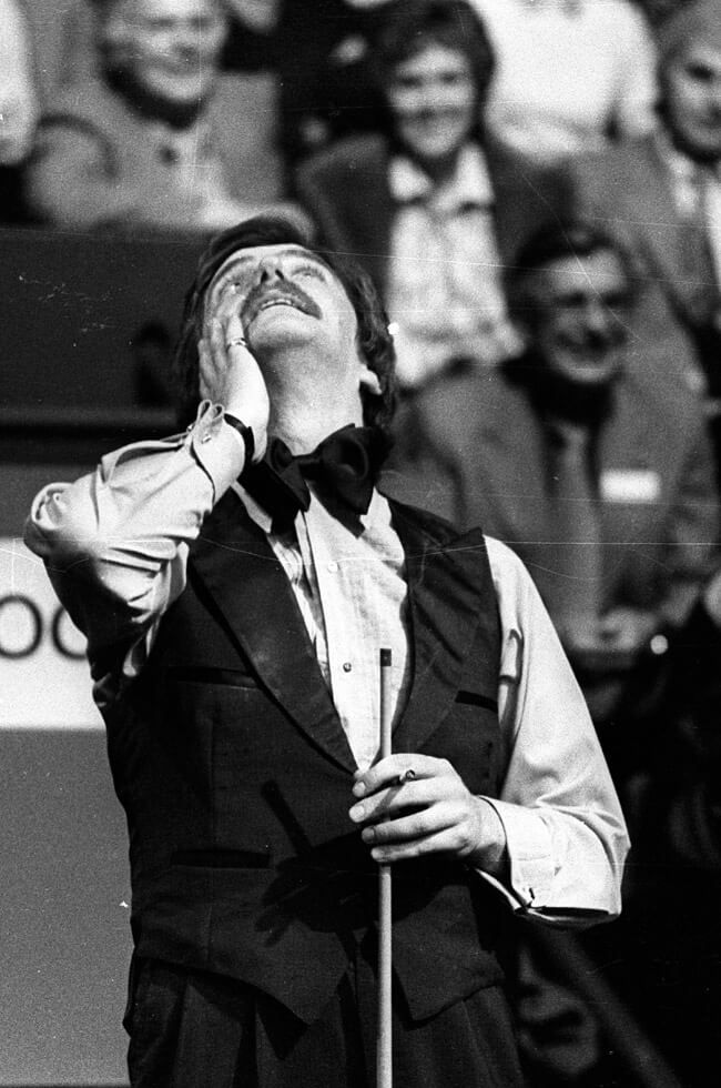 Cliff Thorburn raises the World Championship trophy at the Crucible, 1980